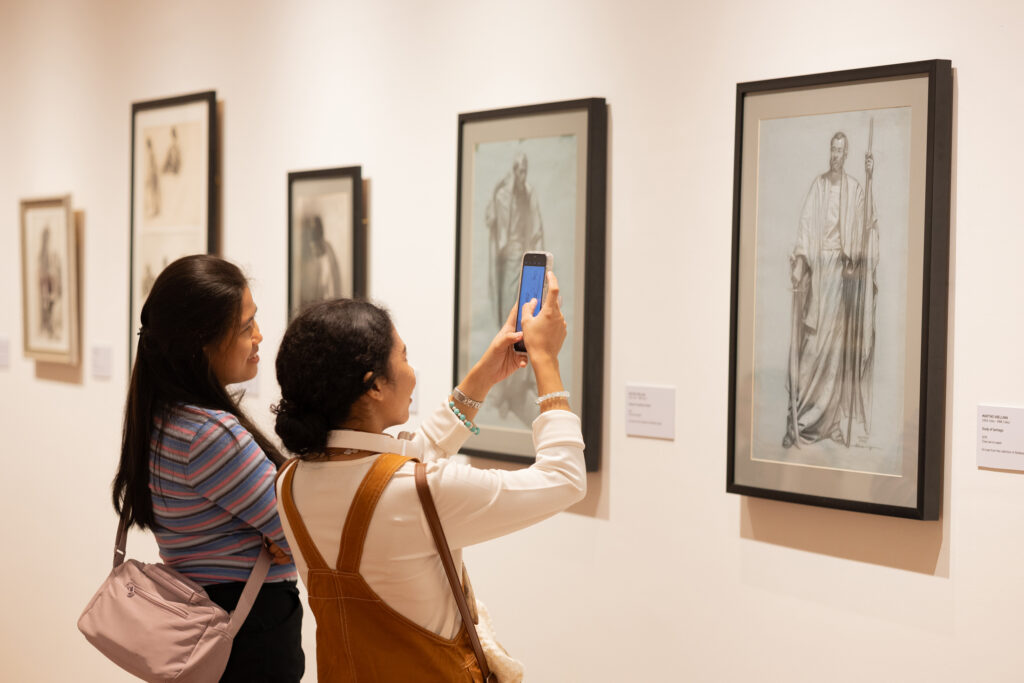 Student documenting Cebu’s culture and heritage inside a museum.